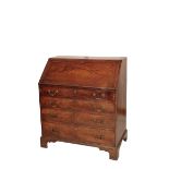 A GEORGE III MAHOGANY BUREAU,