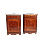 A PAIR OF LOUIS XVI STYLE WALNUT AND MARQUETRY ENCOIGNURES,
