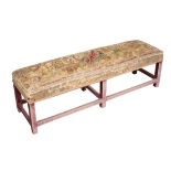 A SILK NEEDLEWORK AND VELVET UPHOLSTERED LONG STOOL,