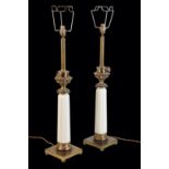 A PAIR OF GILT METAL MOUNTED CERAMIC COLUMNAR TABLE LAMPS