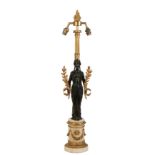 A PATINATED AND GILT BRONZE TWIN LIGHT TABLE LAMP, IN EMPIRE TASTE,