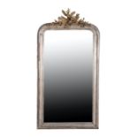 A CONTINENTAL SILVERED PINE AND COMPOSITION FRAMED PIER MIRROR,
