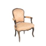 A LATE LOUIS XV CARVED AND PAINTED WOOD FAUTEUIL,