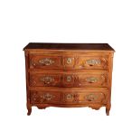 A LOUIS XV CHESTNUT COMMODE,