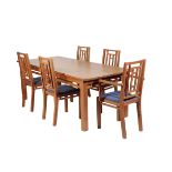 A CONTEMPORARY DORSET CHERRYWOOD DINING TABLE AND TEN CHAIRS, BY JOHN WRIGHT,