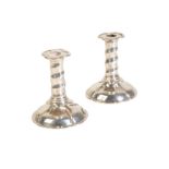 A PAIR OF DUTCH SILVER MINIATURE CANDLESTICKS