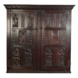 AN OAK CUPBOARD,