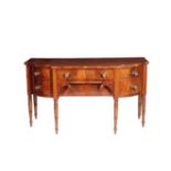 A REGENCY MAHOGANY BOWFRONTED SIDEBOARD,