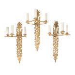 A SET OF SIX EMPIRE STYLE GILT METAL WALL LIGHTS