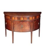 A GEORGE III MAHOGANY BOW FRONTED SIDEBOARD,