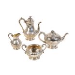 A VICTORIAN FOUR PIECE SILVER TEA SET