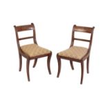 A SET OF FOUR REGENCY MAHOGANY DINING CHAIRS,