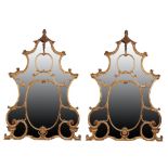 A PAIR OF CARVED GILTWOOD AND COMPOSITION OVERMANTEL MIRRORS,