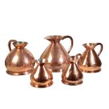 AN ASSOCIATED GROUP OF FIVE VICTORIAN COPPER 'HAYSTACK' WINE MEASURES,