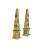 A PAIR OF REGENCY STYLE POTTERY OBELISKS