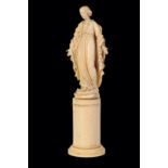 A DIEPPE SCULPTED IVORY MODEL OF SAINT MARGARET,