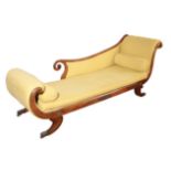 AN EMPIRE UPHOLSTERED AND STAINED HARDWOOD CHAISE LONGUE,
