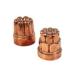 TWO LARGE VICTORIAN CASTELLATED COPPER 'JELLY' MOULDS,