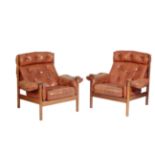 GUY ROGERS: A 'SANTA FE' THREE SEATER SOFA AND PAIR OF ARMCHAIRS