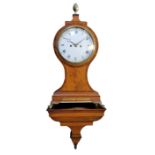 A FINE GEORGE III SATINWOOD BALLOON-SHAPED BRACKET CLOCK