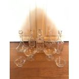 A COLLECTION OF CUT GLASS DECANTERS