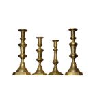 A PAIR OF VICTORIAN BRASS BALUSTER CANDLESTICKS