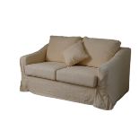 A CONTEMPORARY CREAM UPHOLSTERED SOFA BED