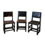 A SET OF THREE CROMWELLIAN STYLE UPRIGHT CHAIRS