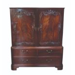 A GEORGE II MAHOGANY LINEN PRESS