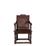 A CHARLES II OAK WAINSCOT CHAIR