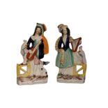 A PAIR OF VICTORIAN STAFFORDSHIRE POTTERY TROUBADOUR FIGURES,