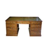 A GEORGE III MAHOGANY PARTNER'S DESK,