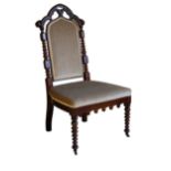 A VICTORIAN MAHOGANY GOTHIC REVIVAL DRESSING CHAIR