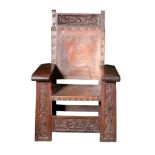 A CONTINENTAL ARTS AND CRAFTS WALNUT ARMCHAIR, CIRCA 1900