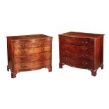 AN IMPORTANT PAIR OF GEORGE III MAHOGANY SERPENTINE CHESTS OF DRAWERS