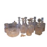 A COLLECTION OF CUT-GLASS AND MOULDED GLASS DECANTERS