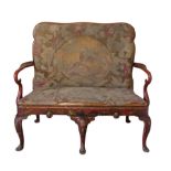 A QUEEN ANNE STYLE RED JAPANNED AND TAPESTRY UPHOLSTERED SETTEE, EARLY 20TH CENTURY