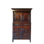 A CHARLES II OAK PRESS CUPBOARD