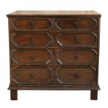 A CHARLES II OAK CHEST OF DRAWERS,