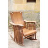 AN OAK ROCKING CHAIR,