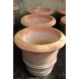 A SET OF THREE ITALIAN TERRACOTTA GARDEN URNS,