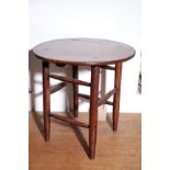 A CIRCULAR OAK OCCASIONAL TABLE, BY GORDON RUSSELL,