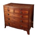 A GEORGE III MAHOGANY BOW FRONT BACHELOR'S CHEST OF DRAWERS, ATTRIBUTABLE TO GILLOWS,