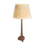 A CONTINENTAL CARVED AND GESSOED TABLE LAMP,