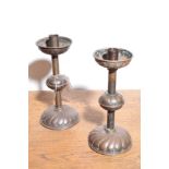 A PAIR OF VICTORIAN REPOUSSE COPPER CANDLESTICKS IN GOTHIC REVIVAL STYLE,