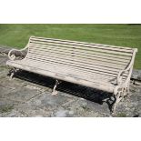 A VICTORIAN CAST IRON AND SLATTED WOOD GARDEN BENCH,