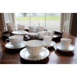 AN EXTENSIVE ROYAL WORCESTER DINNER SERVICE,