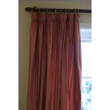 A PAIR OF PRINTED PINK COTTON CURTAINS,