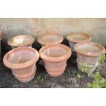 A SET OF SIX ITALIAN TERRACOTTA GARDEN URNS,