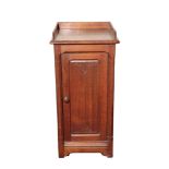 A VICTORIAN OAK BEDSIDE CUPBOARD IN GOTHIC STYLE, IN THE MANNER OF A.W.N. PUGIN AND ALMOST...